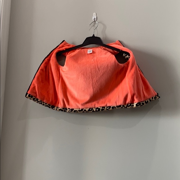 It is a cheetah vest it is Black and Tan - Picture 3 of 4